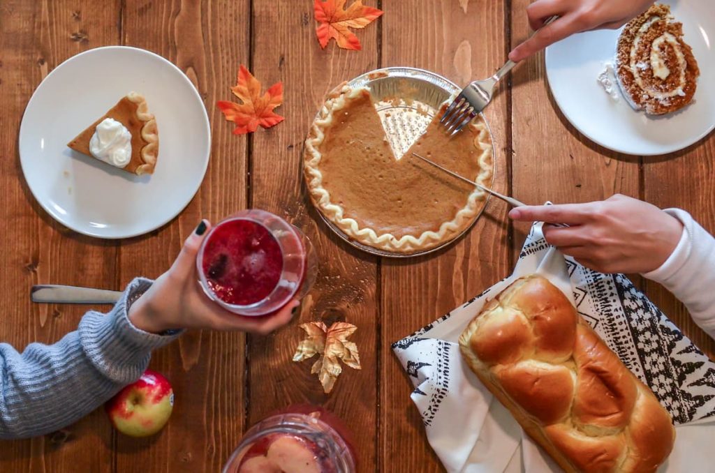 People enjoying a pumpkin pie